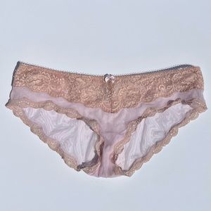 Victoria’s Secret bikini panties, size Medium, lace detail, sits at hip
